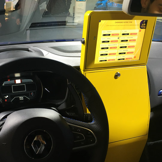 tablet placed inside the car at the Atelier Renault